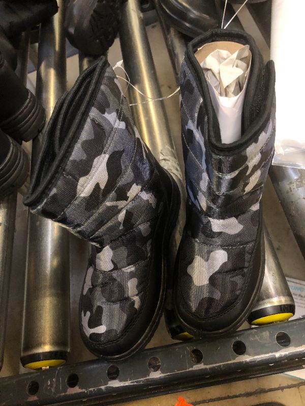 Photo 1 of KIDS CAMO BOOTS
12