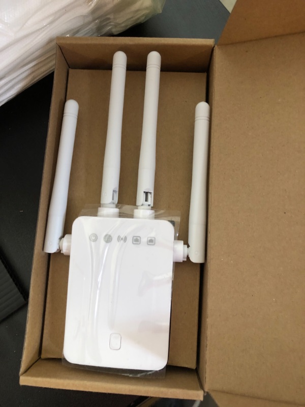 Photo 2 of 2024 WiFi Extender - Wireless Signal Repeater Booster up to 9800 sq.ft - 1200Mbps Wall-Through Strong WiFi Booster-Dual Band 2.4G and 5G - 4 Antennas 360 Degree Full Coverage
