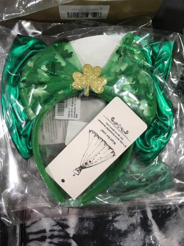 Photo 2 of JEAIRTS St Patrick's Day Headband Green Bow Shamrock Hairband Lucky Clover Irish Headpiece Festive Costume Headwear Hair Accessories for Women and Girls Style 2