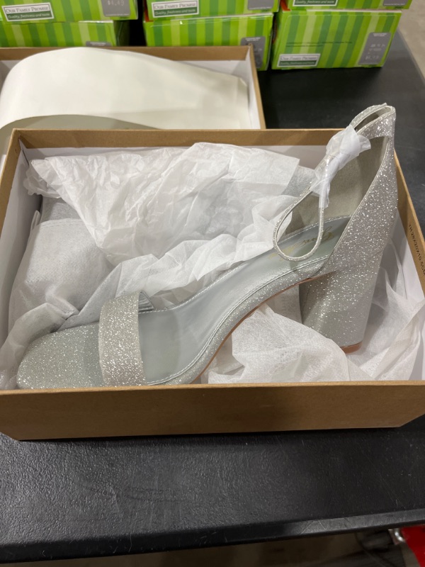 Photo 1 of WOMENS SHOES. 8.5 SILVER