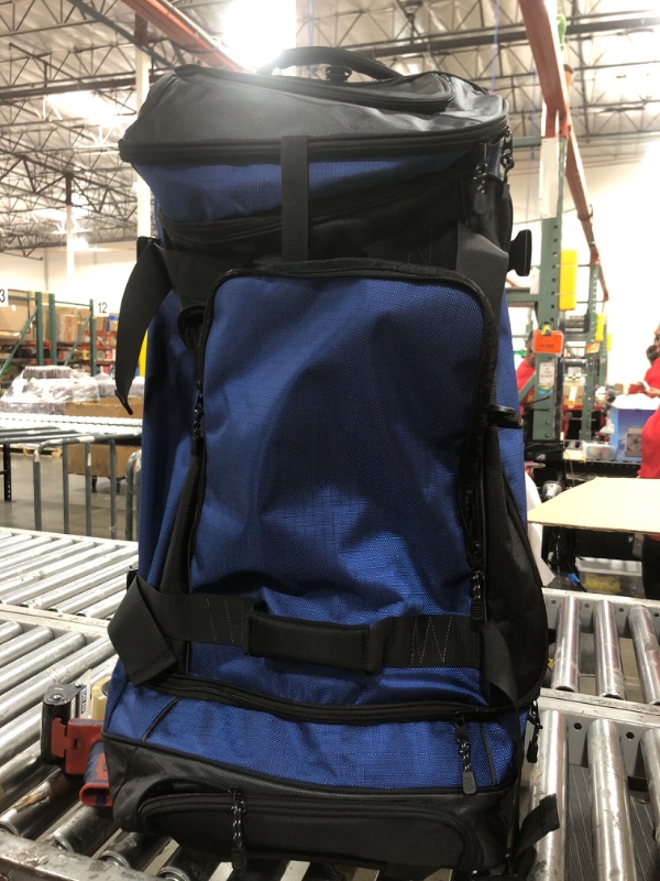 Photo 1 of Amazon Basics Ripstop Wheeled Duffel Bag for Travel, Travel Bag, Telescoping Handle, 35", Blue
