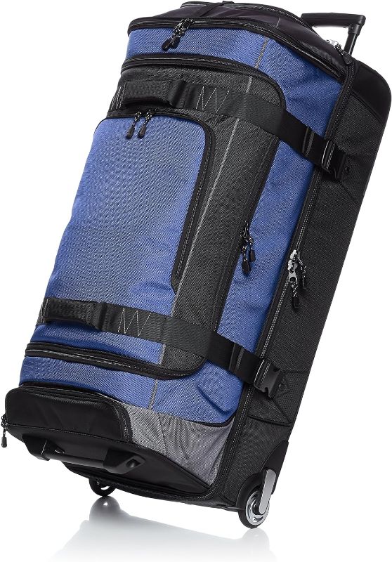 Photo 1 of Amazon Basics Ripstop Wheeled Duffel Bag for Travel, Travel Bag, Telescoping Handle, 35", Blue
