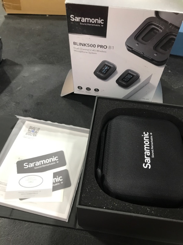 Photo 2 of Saramonic Blink500 Pro B1 Mini Dual-Channel Stereo Wireless Microphone with Charging Case, OLED Display& 3.5mm Headphone Output for DSLR, Mirrorless and Video Cameras, Smartphones, Tablets, Computers