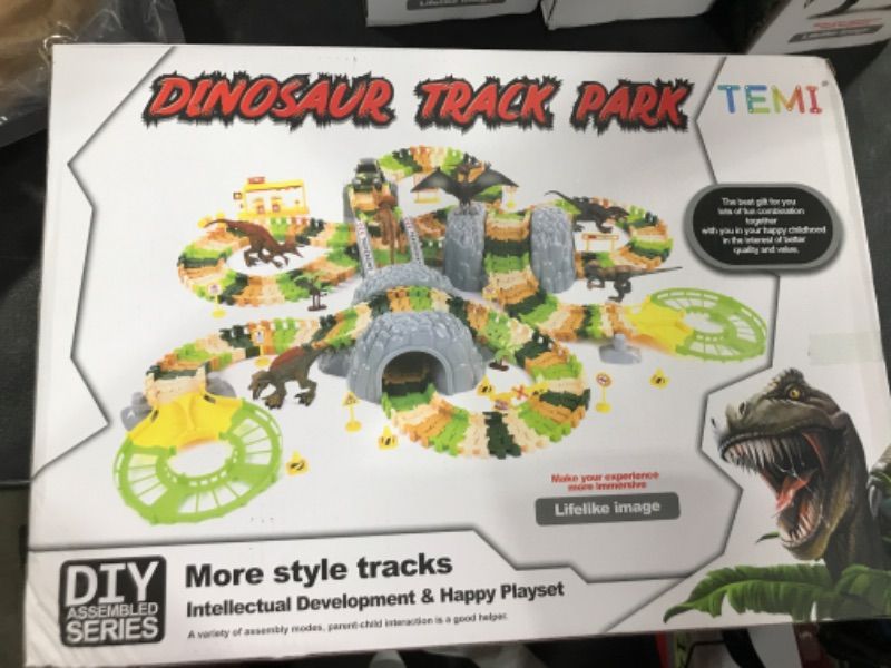 Photo 2 of TEMI Dinosaur Train Toys for Kids, Longer Track, 6 Realistic Jurassic Dino Figures, 2 Electric Toy Car, Twisted Flexible Train Track Set for Toddlers, Boys & Girls 3 4 5 6 7 Years dinosaurs+tracks+cars