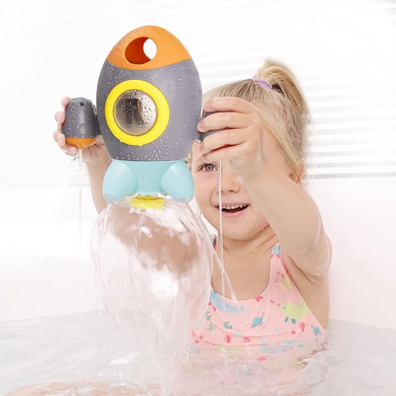 Photo 1 of HEMRLY Bath Toys, Space Rocket Bath Toys for Toddlers 1-3, Baby Bath Toy Rotating Spray Water for Baby, Baby Shower Bath Toys for Toddlers, Girls and Boys Bath Toys for Toddlers 3 Years
