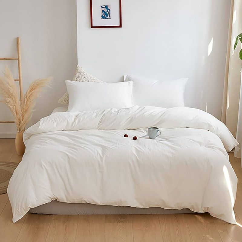 Photo 1 of WHITE COMFORTER BLANKET UNKNOWN SIZE