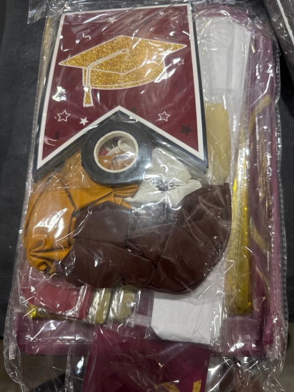 Photo 1 of Graduation Party Decorations Maroon and Gold 2024 Graduation Party Supplies Include Banner, Hanging Swirls, Porch Sign, Foil Fringe Curtain, Paper Pompoms, Balloons for Congrats Grad Party Decorations