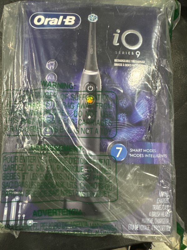 Photo 2 of Oral-B iO Series 9 Electric Toothbrush with 3 Replacement Brush Heads, Black Onyx iO9 Power Handle Black