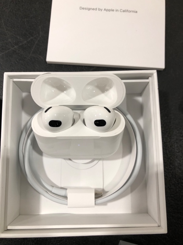Photo 1 of Apple AirPods (3rd Generation) Wireless Ear Buds, Bluetooth Headphones, Personalized Spatial Audio, Sweat and Water Resistant, Lightning Charging Case Included, Up to 30 Hours of Battery Life Without AppleCare+