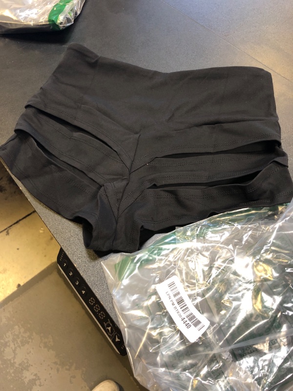 Photo 1 of small black rave shorts