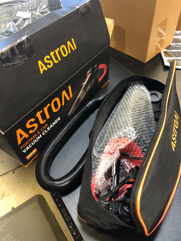 Photo 1 of AstroAI Car Vacuum, Car Accessories, Portable Handheld Vacuum Cleaner with 12V DC Power,16.4 Ft Cigarette Lighter Cord,LED Light,Car Cleaning Kit with 3 Filters for Quick Cleaning(Red)
