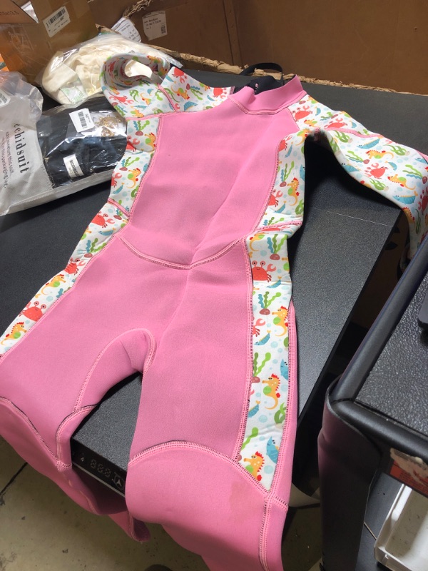 Photo 1 of girls pink wetsuit