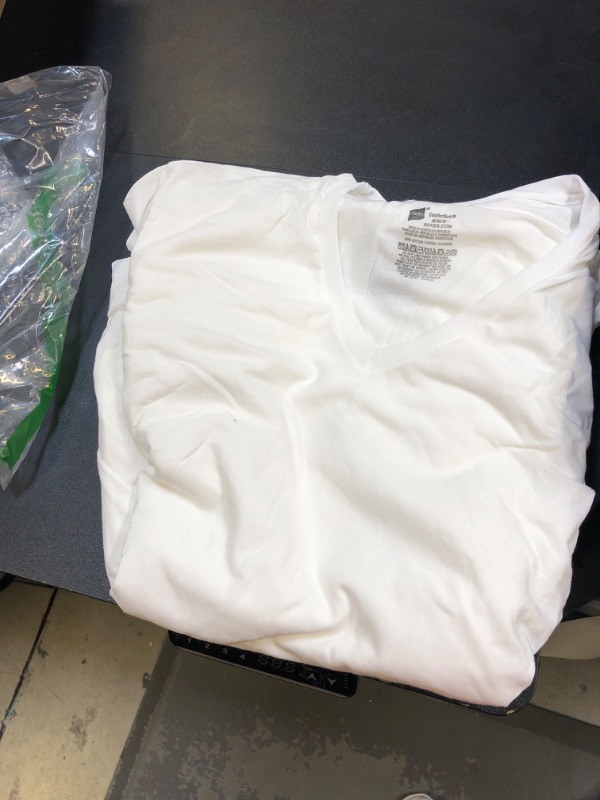 Photo 1 of 6 pack of hanes white shirt  size med 