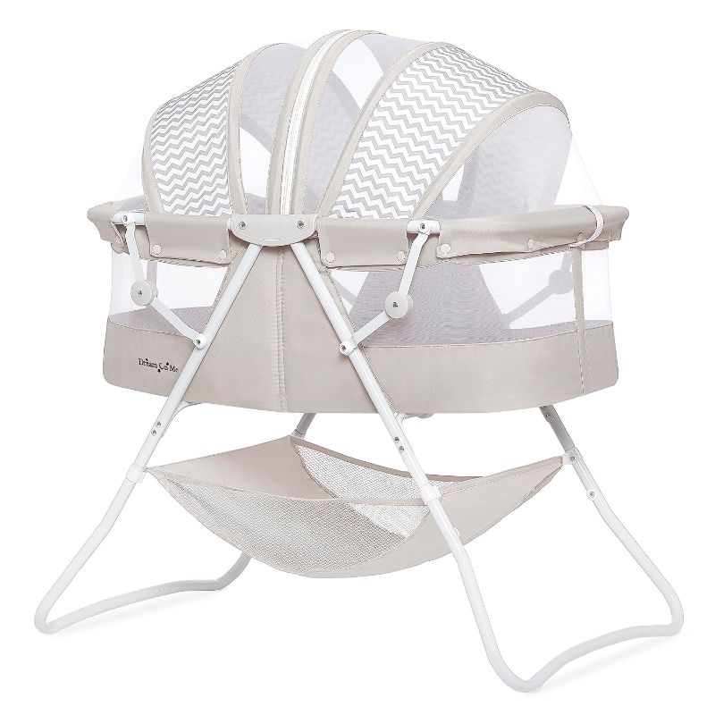 Photo 1 of Karley Bassinet in Grey, Lightweight Portable Baby Bassinet, Quick Fold and Easy to Carry , Adjustable Double Canopy, Indoor and Outdoor Bassinet with Large Storage Basket.
