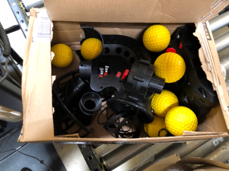 Photo 1 of Upgraded Electronic Baseball Pitching Machine, Adjustable Angles & Speed, AC Adapter or Battery Powered, Comes with 8 Dimpled Balls, for Batting and Fielding Practice of Low Level