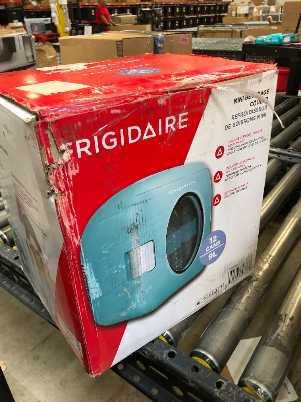 Photo 4 of Frigidaire Retro Mini Personal Fridge Cooler, Holds 9L or 12 Cans, Portable for Car, Office, Bedroom, Dorm Room, or Cabin, Features Plugs for Home Outlet & 12V Car Charger - 10"D x 7"W x 10.5"H, Blue Blue Cooler