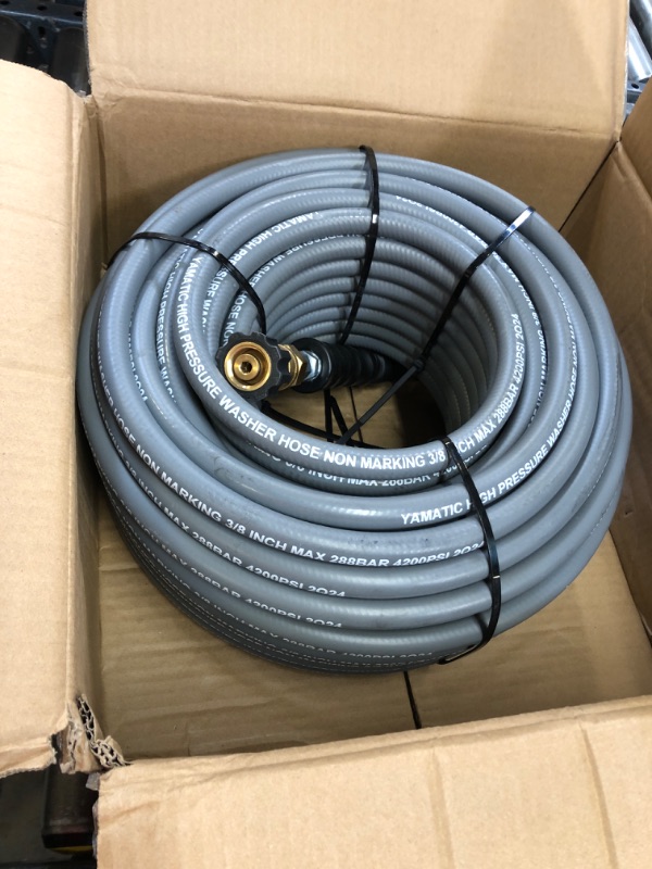 Photo 2 of YAMATIC Non Marking 3/8" 4200 PSI Pressure Washer Hose 125 FT for Hot/Cold Water Rubber Wire Braided, Kink Resistant Swivel 3/8" Quick Connection Industry Grade for Power Washer, Super Wear Resistant Gray 125FT