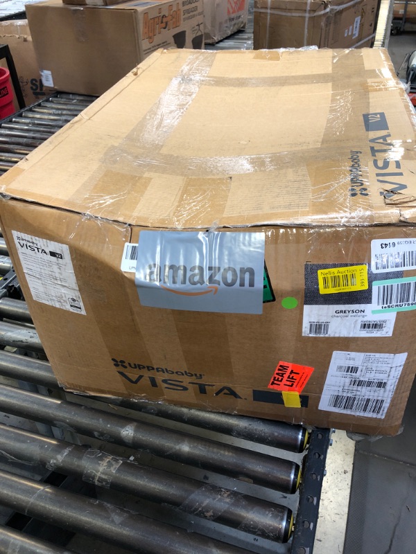 Photo 4 of UPPAbaby Vista V2 Stroller / Convertible Single-To-Double System / Bassinet, Toddler Seat, Bug Shield, Rain Shield, and Storage Bag Included / Greyson (Charcoal Mélange/Carbon Frame/Saddle Leather) Greyson Bassinet