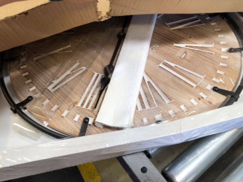 Photo 1 of MODE HOME Large Farmhouse Wall Clock, 24 Inch Rustic Wooden Wall Clock Decorative with Metal Circle and Engraved Numerals, Silent Battery Operated for Kitchen Bedroom Living Room Fireplace Mantel Yellow