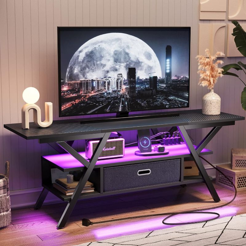 Photo 1 of Bestier LED Entertainment Center with Power Outlets Gaming TV Stand for TV up to 65 Inch 55” TV Game Console for Living Room Bedroom Removable Drawer 20 Dynamic RGB Modes, Carbon Fiber Black
