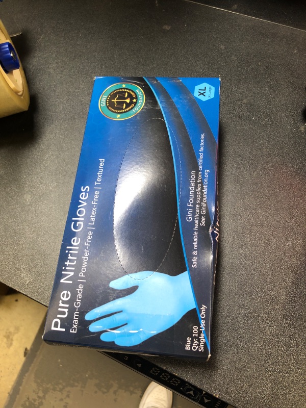 Photo 1 of PURE NITRILE GLOVES X-LARGE 100 PC