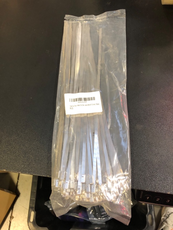 Photo 1 of Metal Zip Ties - Heavy Duty Self-Locking Stainless Steel Cable Ties for Machinery, Vehicles, Farms, Pipes and More (11.8 inch, 100pcs)