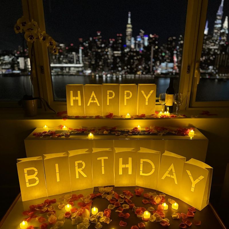 Photo 1 of “Happy Birthday” light up letters with LED lights and rose petals included | Luminary paper bags to be used as happy birthday decorations for your loved one
