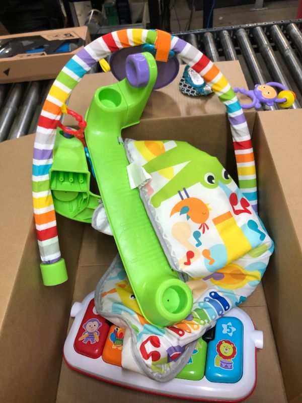 Photo 2 of Fisher-Price Baby Playmat Deluxe Kick & Play Piano Gym Learning Toy & 2 Maracas Soft Rattles for Newborn to Toddler Play Ages 0+ Months
