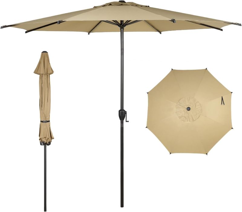 Photo 1 of Abba Patio 9FT Lyon Outdoor Patio Umbrella Outdoor Table Umbrella with Push Button Tilt and Crank Market Umbrella 8 Sturdy Ribs UV Protection Waterproof for Garden Deck Backyard Pool Dark Blue 9 FT Color: Tan

