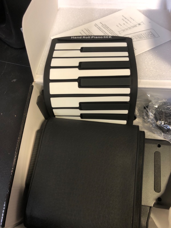 Photo 1 of  Island Novelty Electronic Roll Up Piano Keyboard - Portable Piano Keyboard for Beginners, USB Musical Keyboard, Premium Sound Electric Keyboard for Children, Teens and Adults - 85 Keys
