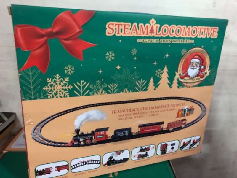 Photo 1 of Train Set - Christmas Train Sets for Under The Tree, Electric Train Toy Gift for Boys Girls, with Railway Kits,Cargo Cars & Tracks,Light,Smokes & Sound,for 3 4 5 6 7 8+ Year Old Kids
