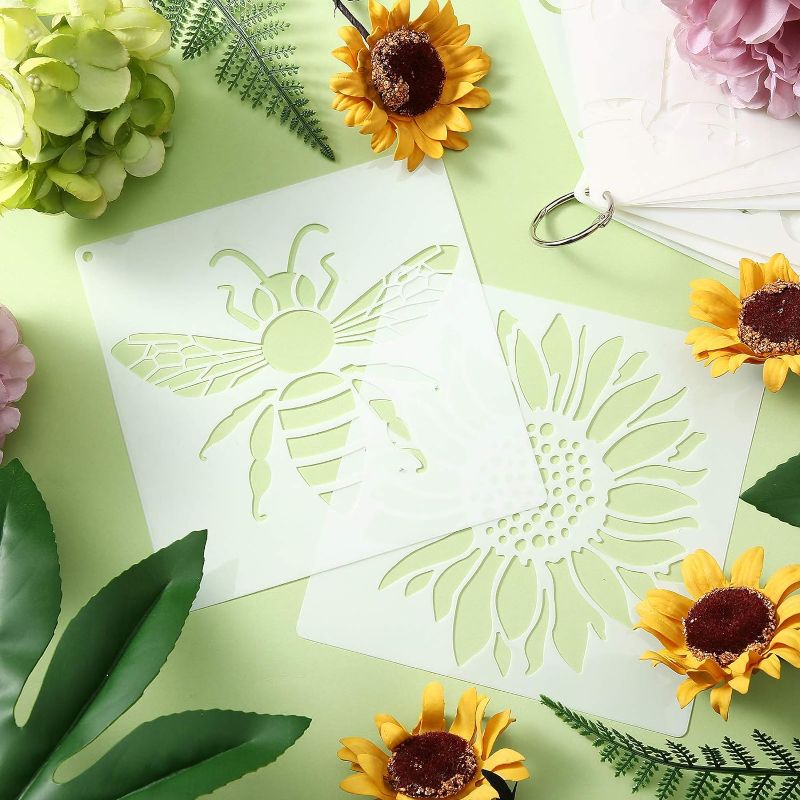 Photo 1 of 16 Pieces Flower Stencil for Painting Bee Sunflower Butterfly Spring Stencil Large Template Reusable Summer Painting Stencil and Metal Open Ring for DIY Craft on Wood Wall Home Decor(6  x 6.  Inch)
