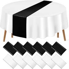 Photo 1 of 12Pack 12x108 Inch Satin Table Runner and 84 Inch Round Plastic Tablecloths White and Black Disposable Round Table Cover for Graduation Wedding Bridal Shower Anniversary Birthday Party Decorations White Black 12 Pack