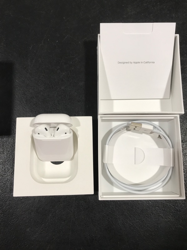 Photo 4 of Apple AirPods (2nd Generation) Wireless Ear Buds, Bluetooth Headphones with Lightning Charging Case Included, Over 24 Hours of Battery Life, Effortless Setup for iPhone Without AppleCare+