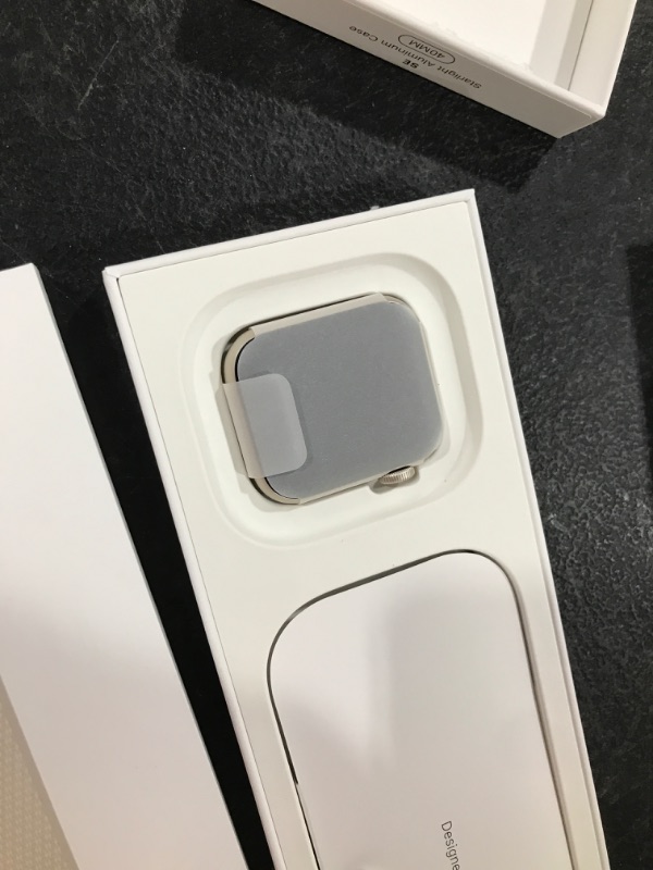 Photo 1 of Apple Watch SE GPS (2023, 2nd Generation) 40mm Starlight Aluminum Case with Starlight Sport Loop