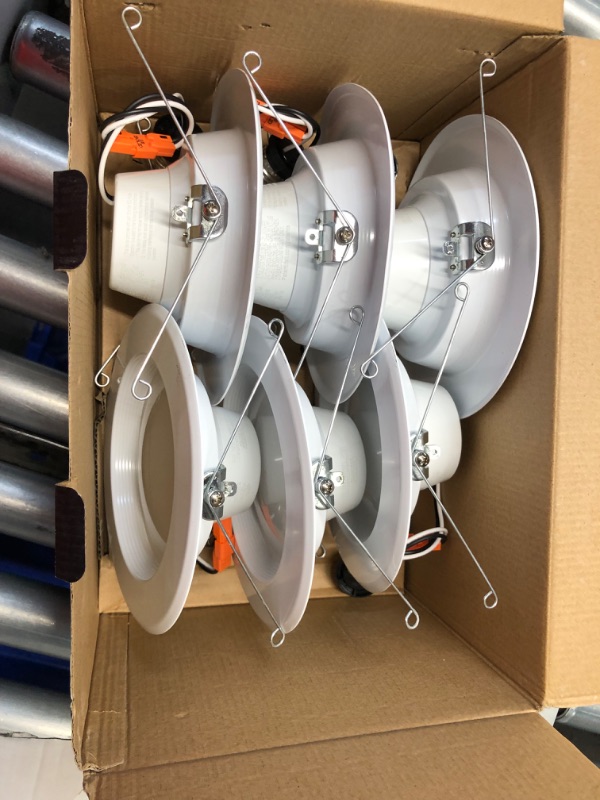 Photo 3 of ***USED - LIKELY MISSING PARTS - UNABLE TO VERIFY FUNCTIONALITY***
Feit Electric LED Recessed Downlight, fit most 5-6" Housing Cans, Baffle Trim, Dimmable, 75W Equivalent 10.2W, 925 LM Retrofit kit, 75 Watt, 2700K Soft White, 6-Pack LEDR56B/927CA/MP/6 5-6