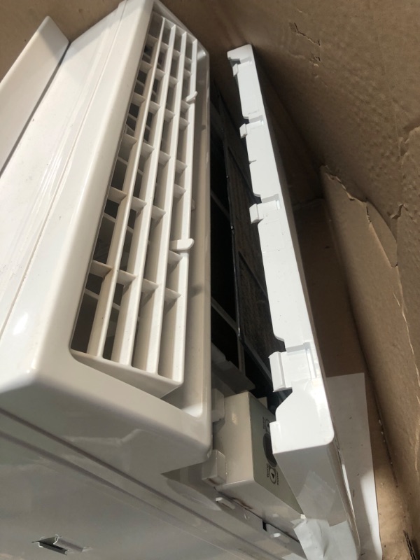 Photo 4 of **SEE NOTES**14,500 BTU 115V Window Air Conditioner Cools 650 Sq. Ft. with Dehumidifier and Smart Remote Control in White
