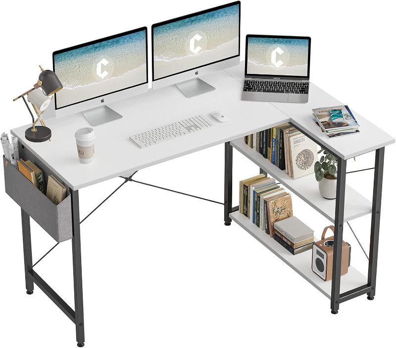 Photo 1 of ***USED - LIKELY MISSING PARTS - UNABLE TO VERIFY FUNCTIONALITY***
CubiCubi L Shaped Desk, 55 Inch Computer Desk with Reversible Storage Shelves Home Office Corner Desk Study Writing Table, White Top/Black Leg