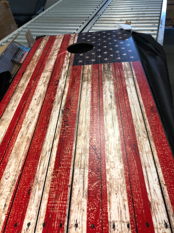 Photo 1 of **DAMAG ON CORNER**
GoSports American Flag Regulation Size Cornhole Set Includes 8 Bags Carry Case Rulesiuij