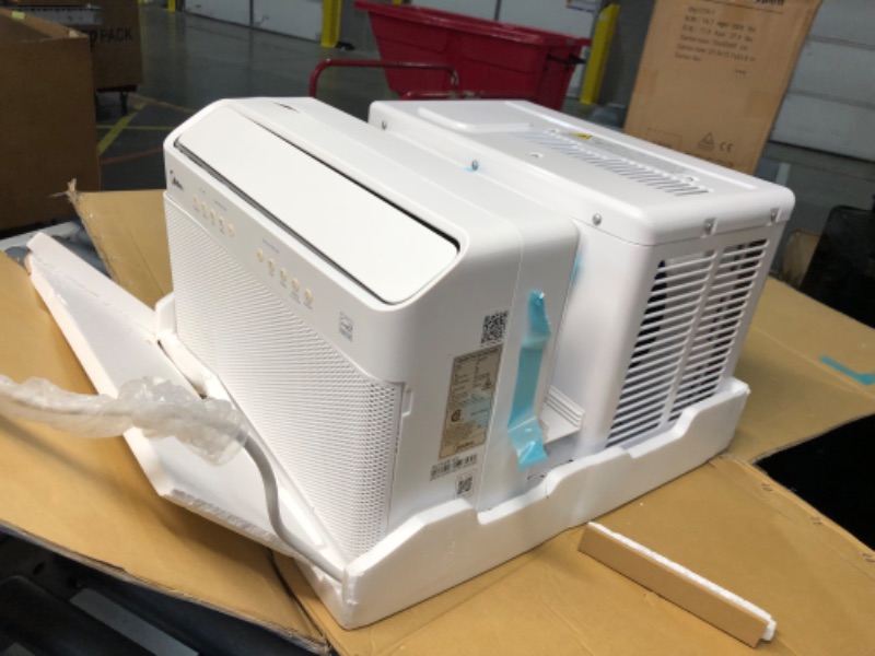 Photo 9 of ***DAMAGED - UNTESTED - SEE COMMENTS*** 
Midea 8,000 BTU U-Shaped Smart Inverter Air Conditioner –Cools up to 350 Sq. Ft., Ultra Quiet with Open Window Flexibility, Works with Alexa/Google Assistant, 35% Energy Savings, Remote Control