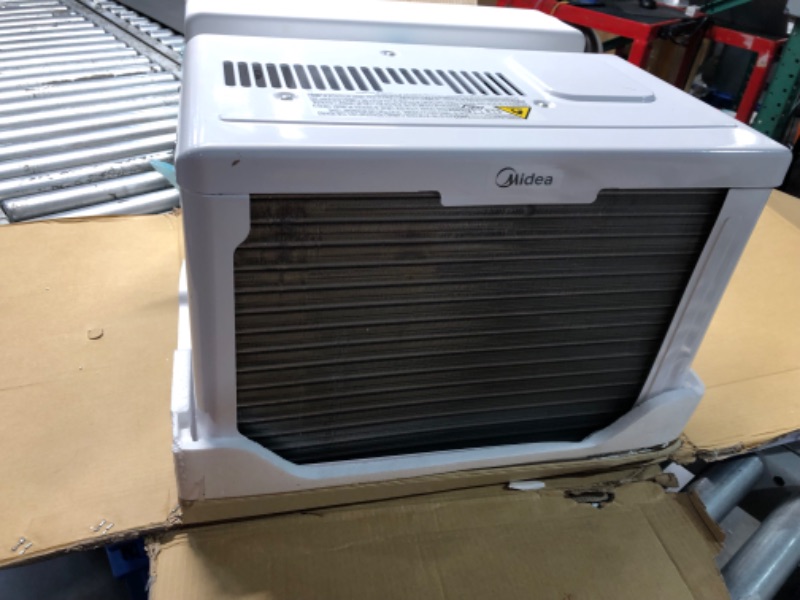 Photo 8 of ***DAMAGED - UNTESTED - SEE COMMENTS*** 
Midea 8,000 BTU U-Shaped Smart Inverter Air Conditioner –Cools up to 350 Sq. Ft., Ultra Quiet with Open Window Flexibility, Works with Alexa/Google Assistant, 35% Energy Savings, Remote Control