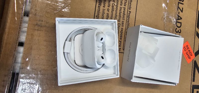 Photo 2 of Apple AirPods Pro (2nd Generation) Wireless Ear Buds with USB-C Charging, Up to 2X More Active Noise Cancelling Bluetooth Headphones, Transparency Mode, Adaptive Audio, Personalized Spatial Audio (S#-C3VO76VM04) (FACTORY SEALED)