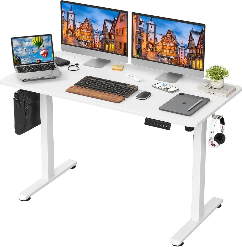 Photo 1 of ***USED - LIKELY MISSING PARTS - UNABLE TO VERIFY FUNCTIONALITY***
STARY Electric Adjustable Height Sit Stand Home Office Desk with Splice Board, 4824, White Desktop