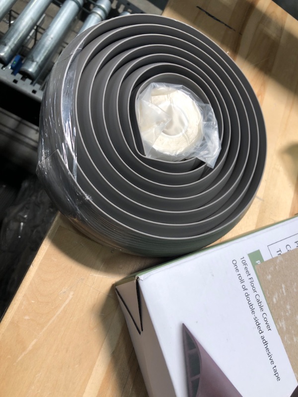 Photo 1 of 10FT Floor Cord Cover, Grey Cord Hider Floor, Durable Cord Covers for Wires on Floor, Cable Floor Cover Power Cord Cover, Floor Cord Protector Hide Cords on Floor Cord Cavity: 0.47" W x 0.24" H 10 feet Grey