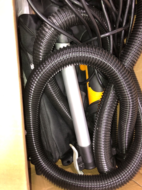 Photo 2 of orange and black carpet cleaner / vacuum 