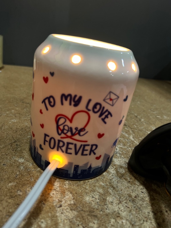 Photo 3 of A white sent oil candle with the message " TO MY LOVE FOREVER" 