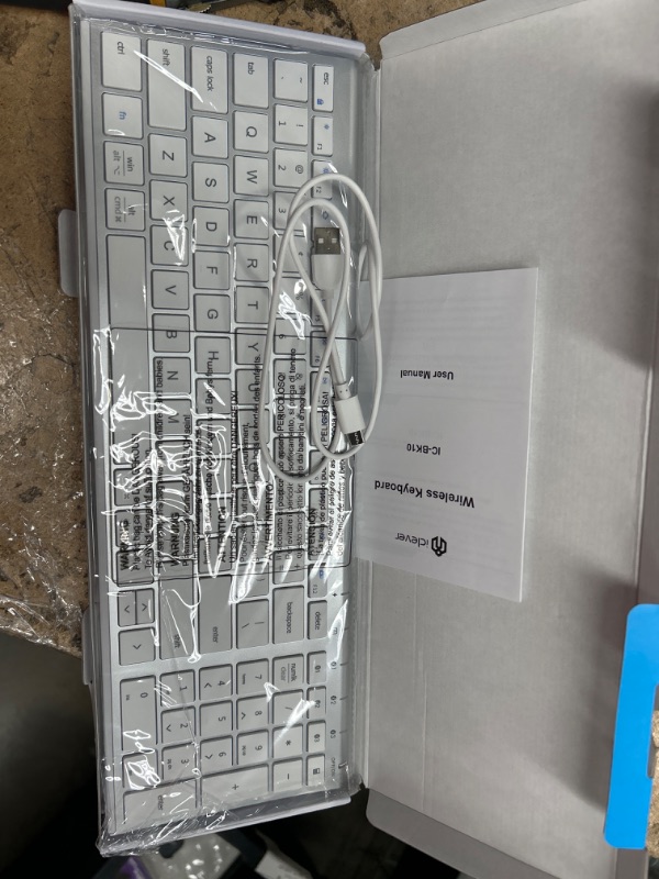 Photo 1 of **silicone cover missing***
iClever BK10 Bluetooth Keyboard, Multi Device Keyboard Rechargeable Bluetooth 5.1 with Number Pad Ergonomic Design Full Size Stable Connection Keyboard for iPad, iPhone, Mac, iOS, Android, Windows silver