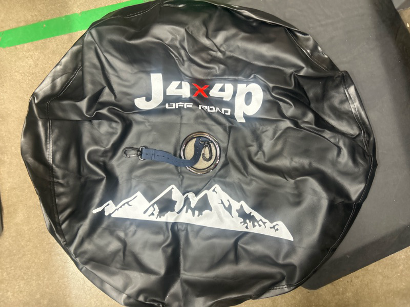 Photo 1 of (APPROXIMATELY)  30" round jeep spare tire cover