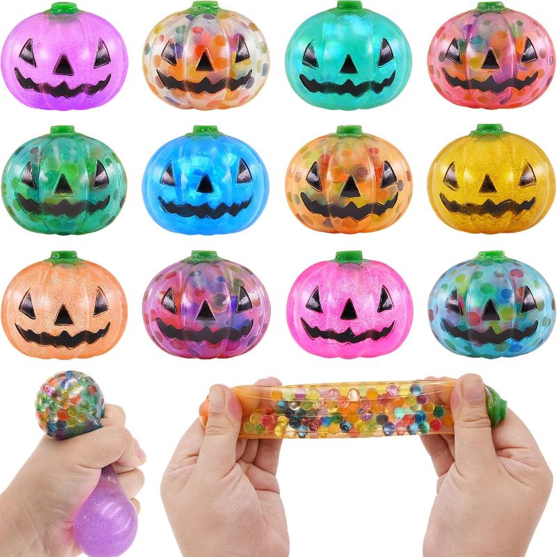 Photo 1 of 12 Pack Halloween Pumpkins Stress Balls Fidget Toys Squishy Squeeze Ball Toys for Halloween Party Favors Halloween Treat Bags Gifts Halloween 12 Pumpkin