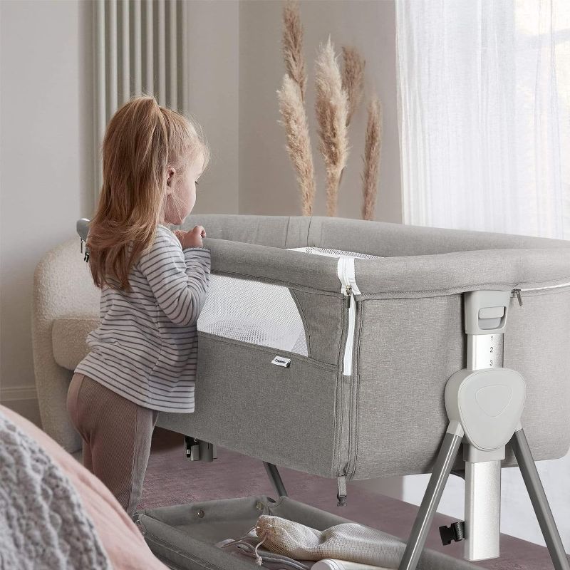 Photo 1 of 
Cowiewie Baby Bassinet, Beside Sleeper for Baby Easy Folding Bedside Bassinet with Storage Basket and Wheels to Reduce Mom's Fatigue 